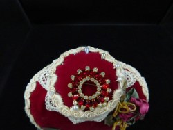 red white brooch
